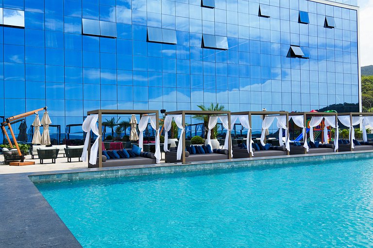 Suíte vista montanha no Blue Sea Hotel, lazer completo beira
