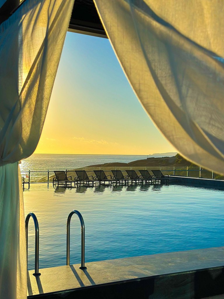 Suíte vista montanha no Blue Sea Hotel, lazer completo beira